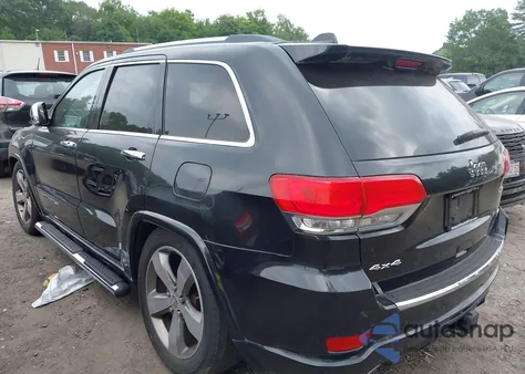 2014 Jeep Grand Cherokee Overland z USA, uszkodzony, nr VIN 1C4RJFCG4EC415991